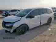 2023 Honda Odyssey Sport z VIN 5FNRL6H72PB056617, wystawiony jako Copart lot #63094705 z przebiegiem 53 162 mil mil oraz Szkoda całkowita • Salvage title. Historia ofert i sprzedaży dostępna na DreamBid. Obrazek 1.