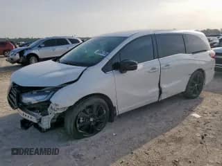 2023 Honda Odyssey Sport z VIN 5FNRL6H72PB056617, wystawiony jako Copart lot #63094705 z przebiegiem 53 162 mil mil oraz Szkoda całkowita • Salvage title. Historia ofert i sprzedaży dostępna na DreamBid. Obrazek 1.