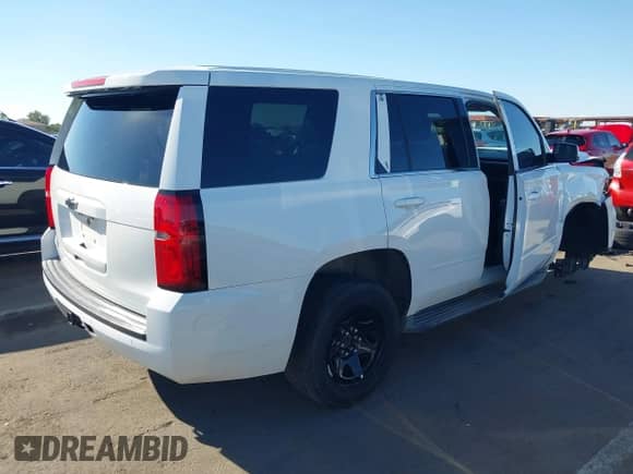 2015 Chevrolet Tahoe Commercial with VIN 1GNLC2KC7FR525530, listed as a IAAI auction lot 43305926 with 224,780 mi miles and . Bid and sale history available at DreamBid. Image 4.