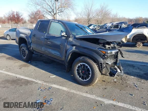 2024 Toyota Tacoma SR5 with VIN 3TMLB5JN3RM028853, listed as a IAAI auction lot 40990601 with 10,095 mi miles and . Bid and sale history available at DreamBid. Image 1.