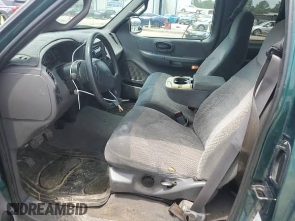 2000 Ford F-150 XL z VIN 1FTRX17W6YNC01533, wystawiony jako Copart lot #62307545 z przebiegiem 280 487 mil mil oraz Szkoda całkowita • Salvage title. Historia ofert i sprzedaży dostępna na DreamBid. Obrazek 7.