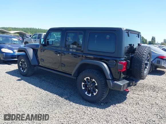 2024 Jeep Wrangler Rubicon z VIN 1C4PJXFG0RW321491, wystawiony jako IAAI lot #42461809 z przebiegiem 10 419 mil mil oraz . Historia ofert i sprzedaży dostępna na DreamBid. Obrazek 3.