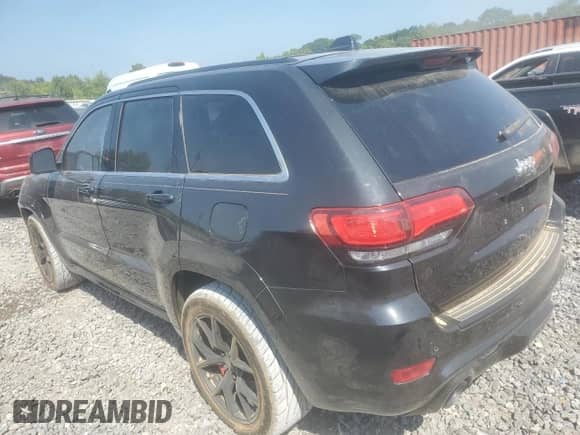 2015 Jeep Grand Cherokee SRT с VIN 1C4RJFDJ3FC168930, выставлен на аукционе Copart как лот 64122555 с пробегом 43 324 миль миль и Списание • Salvage title. История ставок и продаж доступна на DreamBid. Изображение 2.