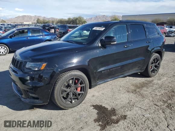2020 Jeep Grand Cherokee SRT with VIN 1C4RJFDJ8LC194757, listed as a Copart auction lot 49316055 with 54,416 mi miles and Salvage title. Bid and sale history available at DreamBid. Image 1.