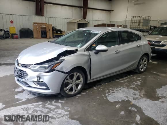 2018 Chevrolet Cruze Premier with VIN 3G1BF6SM2JS597410, listed as a Copart auction lot 68855475 with 112,709 mi miles and Salvage title. Bid and sale history available at DreamBid. Image 1.