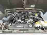 2004 Jeep Wrangler X z VIN 1J4FA39S64P753911, wystawiony jako Copart lot #86479285 z przebiegiem 138 801 mil mil oraz Czysty tytuł • Clean title. Historia ofert i sprzedaży dostępna na DreamBid. Obrazek 7.