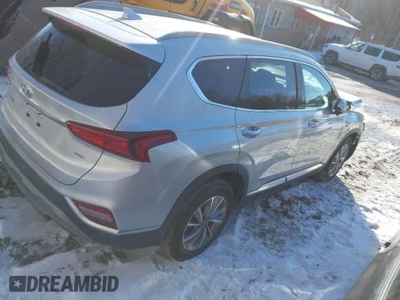 2019 Hyundai Santa Fe SEL with VIN 5NMS3CAD0KH089882, listed as a IAAI auction lot 41613964 with 38,371 mi miles and . Bid and sale history available at DreamBid. Image 4.