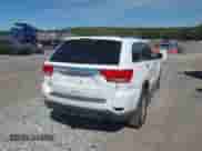 2013 Jeep Grand Cherokee Limited z VIN 1C4RJFBG8DC556272, wystawiony jako IAAI lot #43352592 z przebiegiem 118 793 mil mil oraz . Historia ofert i sprzedaży dostępna na DreamBid. Obrazek 4.