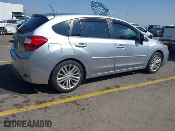 2012 Subaru Impreza Premium z VIN JF1GPAD64CH215617, wystawiony jako IAAI lot #43345861 z przebiegiem 157 056 mil mil oraz . Historia ofert i sprzedaży dostępna na DreamBid. Obrazek 4.