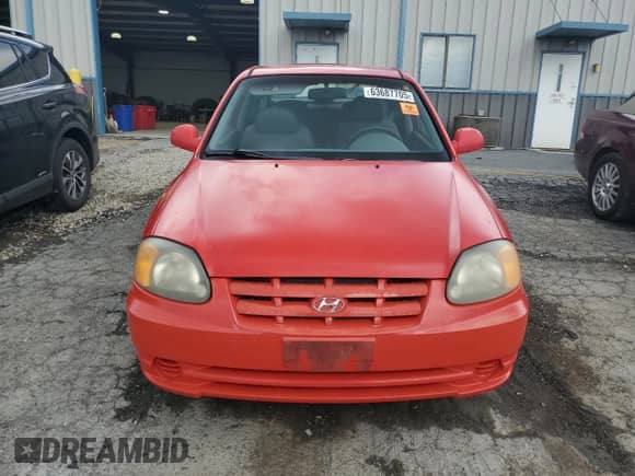 2003 Hyundai Accent GL с VIN KMHCG35C03U266754, выставлен на аукционе Copart как лот 63687705 с пробегом 99 309 миль миль и Списание • Salvage title. История ставок и продаж доступна на DreamBid. Изображение 5.