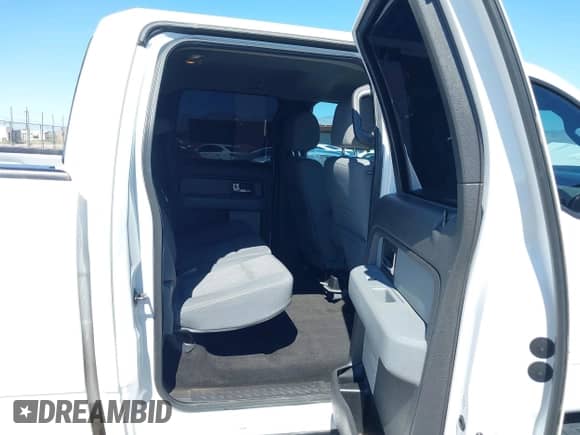 2013 Ford F-150 Lariat with VIN 1FTFW1CT2DKD26820, listed as a IAAI auction lot 43310803 with 186,059 mi miles and . Bid and sale history available at DreamBid. Image 8.