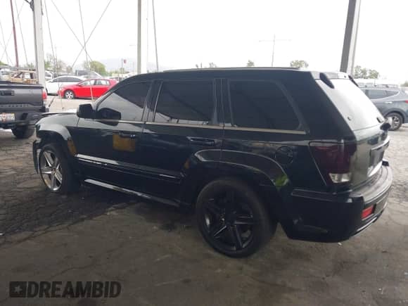 2008 Jeep Grand Cherokee SRT-8 with VIN 1J8HR78398C106661, listed as a IAAI auction lot 42191450 with 128,102 mi miles and . Bid and sale history available at DreamBid. Image 3.