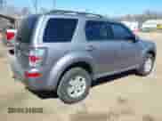 2008 Mercury Mariner with VIN 4M2CU91148KJ50412, listed as a IAAI auction lot 41715972 with 130,426 mi miles and . Bid and sale history available at DreamBid. Image 4.