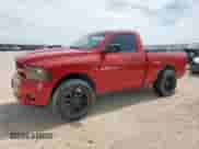 2012 Ram 1500 Express with VIN 3C6JD7AT6CG278287, listed as a Copart auction lot 57054245 with 114,229 mi miles and Salvage title. Bid and sale history available at DreamBid. Image 1.