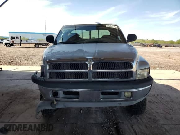 1999 Dodge 2500 with VIN 1B7KF2364XJ648660, listed as a Copart auction lot 69264725 with 167,545 mi miles and Salvage title. Bid and sale history available at DreamBid. Image 5.