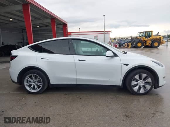 2022 Tesla Model Y Long Range z VIN 7SAYGDEE4NF510003, wystawiony jako IAAI lot #43185983 z przebiegiem 25 165 mil mil oraz . Historia ofert i sprzedaży dostępna na DreamBid. Obrazek 13.