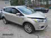 2017 Ford Escape Titanium with VIN 1FMCU9JD0HUC89677, listed as a IAAI auction lot 43418612 with 30,638 mi miles and . Bid and sale history available at DreamBid. Image 1.
