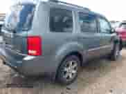 2010 Honda Pilot Touring with VIN 5FNYF3H9XAB008986, listed as a IAAI auction lot 42488828 with 126,662 mi miles and . Bid and sale history available at DreamBid. Image 4.