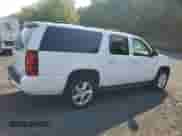 2009 Chevrolet Suburban 2LT z VIN 1GNFK26399R295925, wystawiony jako Copart lot #68805245 z przebiegiem 153 570 mil mil oraz Czysty tytuł • Clean title. Historia ofert i sprzedaży dostępna na DreamBid. Obrazek 3.