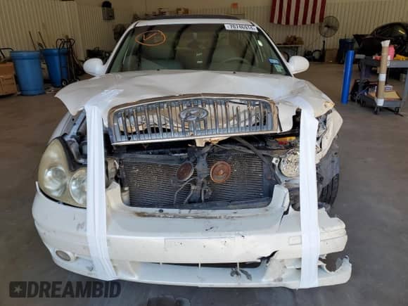 2004 Hyundai Sonata GLS z VIN KMHWF35H84A044428, wystawiony jako Copart lot #70746914 z przebiegiem 207 210 mil mil oraz Szkoda całkowita • Salvage title. Historia ofert i sprzedaży dostępna na DreamBid. Obrazek 5.