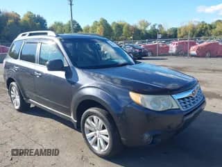 2012 Subaru Forester X Premium z VIN JF2SHADC6CH430943, wystawiony jako IAAI lot #43407192 z przebiegiem 162 606 mil mil oraz . Historia ofert i sprzedaży dostępna na DreamBid. Obrazek 1.