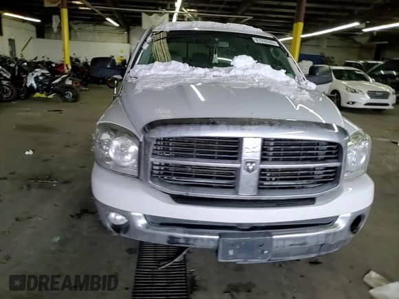 2007 Dodge 1500 SLT z VIN 3D7KR19D07G833903, wystawiony jako Copart lot #87939265 z przebiegiem 229 748 mil mil oraz Szkoda całkowita • Salvage title. Historia ofert i sprzedaży dostępna na DreamBid. Obrazek 10.