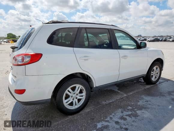 2010 Hyundai Santa Fe GLS с VIN 5NMSG3AB2AH348289, выставлен на аукционе Copart как лот 62336375 с пробегом 177 476 миль миль и Списание • Salvage title. История ставок и продаж доступна на DreamBid. Изображение 3.