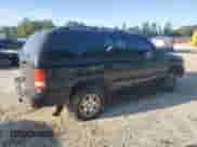 2003 Chevrolet Tahoe LT with VIN 1GNEC13Z93J171106, listed as a Copart auction lot 80452125 with 330,805 mi miles and Salvage title. Bid and sale history available at DreamBid. Image 3.