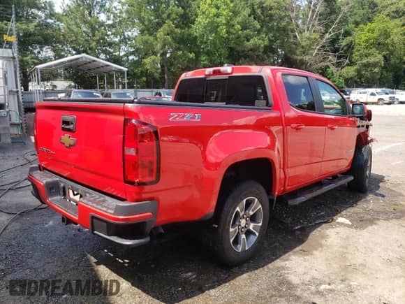 2017 Chevrolet Colorado 2WD Z71 with VIN 1GCGSDEN0H1153519, listed as a Copart auction lot 51181412 with 76,083 mi miles and Salvage title. Bid and sale history available at DreamBid. Image 4.