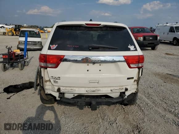 2011 Jeep Grand Cherokee Laredo с VIN 1J4RR4GG2BC617838, выставлен на аукционе Copart как лот 72069035 с пробегом 186 984 миль миль и Списание • Salvage title. История ставок и продаж доступна на DreamBid. Изображение 6.