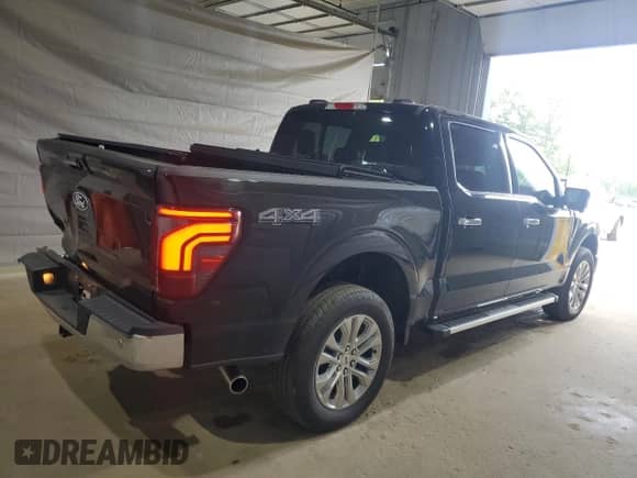 2024 Ford F-150 Lariat with VIN 1FTFW5L83RKE25818, listed as a Copart auction lot 64980445 with 13,717 mi miles and Salvage title. Bid and sale history available at DreamBid. Image 3.