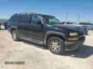 2002 Chevrolet Suburban LS with VIN 3GNFK16Z62G280125, listed as a Copart auction lot 73376894 with 230,480 mi miles and Salvage title. Bid and sale history available at DreamBid. Image 4.