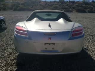 2007 Saturn Sky с VIN 1G8MB35B47Y101765, выставлен на аукционе Copart как лот 68054344 с пробегом 82 064 миль миль и Списание • Salvage title. История ставок и продаж доступна на DreamBid. Изображение 6.