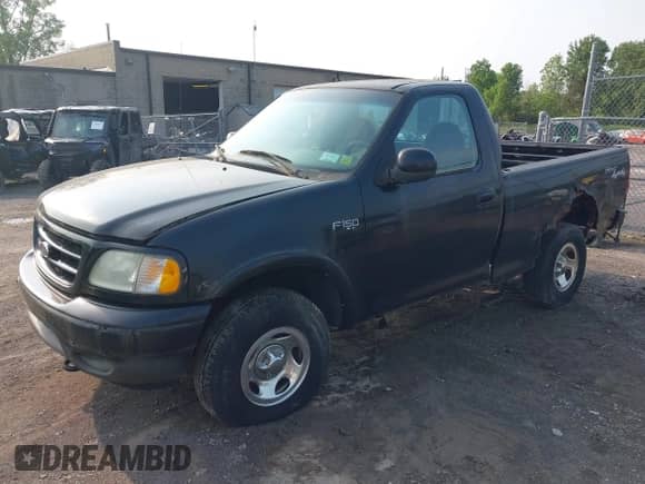2003 Ford F-150 XL z VIN 2FTRF18243CB08751, wystawiony jako IAAI lot #42456956 z przebiegiem 130 805 mil mil oraz . Historia ofert i sprzedaży dostępna na DreamBid. Obrazek 2.
