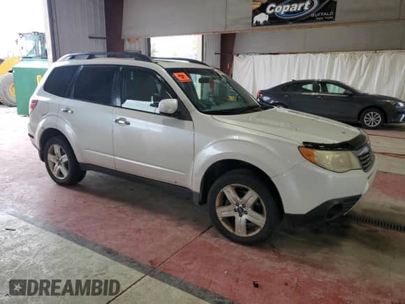 2010 Subaru Forester X Premium with VIN JF2SH6CC1AH732684, listed as a Copart auction lot 83993475 with Not provided miles and Salvage title. Bid and sale history available at DreamBid. Image 4.