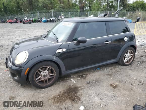 2009 MINI Hardtop S with VIN WMWMF73539TW86916, listed as a Copart auction lot 83832935 with 94,290 mi miles and Clean title. Bid and sale history available at DreamBid. Image 1.