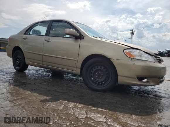 2004 Toyota Corolla CE with VIN 1NXBR32E84Z190780, listed as a Copart auction lot 65021055 with 218,843 mi miles and Salvage title. Bid and sale history available at DreamBid. Image 4.