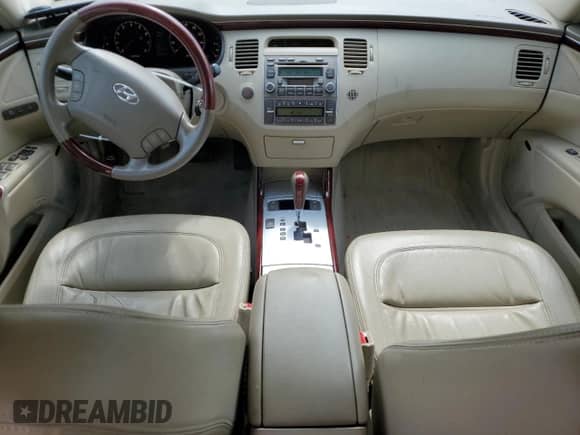 2007 Hyundai Azera SE с VIN KMHFC46F57A179561, выставлен на аукционе Copart как лот 65562574 с пробегом 161 939 миль миль и Списание • Salvage title. История ставок и продаж доступна на DreamBid. Изображение 8.