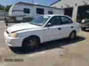 2002 Hyundai Accent GL z VIN KMHCG45C12U343720, wystawiony jako Copart lot #63329455 z przebiegiem 158 251 mil mil oraz Szkoda całkowita • Salvage title. Historia ofert i sprzedaży dostępna na DreamBid. Obrazek 1.