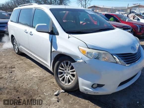 2013 Toyota Sienna XLE AAS with VIN 5TDYK3DC6DS372819, listed as a IAAI auction lot 41395777 with 181,526 mi miles and . Bid and sale history available at DreamBid. Image 6.