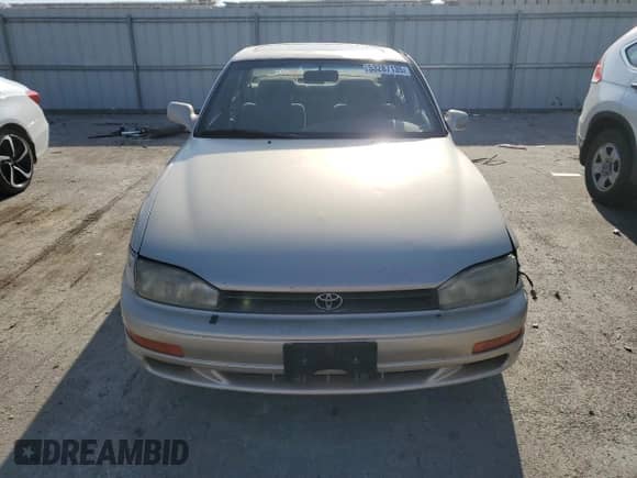 1993 Toyota Camry LE z VIN JT2SK12E5P0127296, wystawiony jako Copart lot #53287135 z przebiegiem 210 714 mil mil oraz Szkoda całkowita • Salvage title. Historia ofert i sprzedaży dostępna na DreamBid. Obrazek 5.