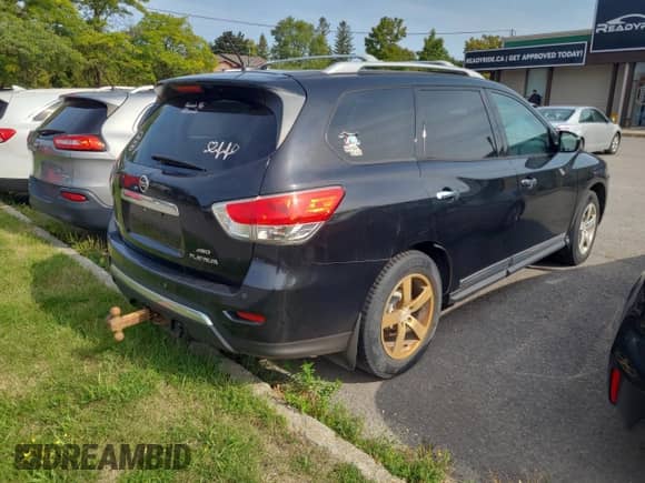 2015 Nissan Pathfinder Platinum with VIN 5N1AR2MM8FC703545, listed as a Copart auction lot 80464315 with 196,099 mi miles and Clean title. Bid and sale history available at DreamBid. Image 4.