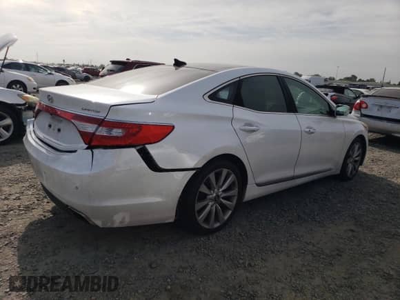2015 Hyundai Azera Limited с VIN KMHFH4JG1FA453595, выставлен на аукционе Copart как лот 52979545 с пробегом 127 620 миль миль и Списание • Salvage title. История ставок и продаж доступна на DreamBid. Изображение 3.