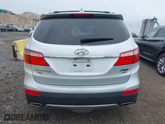 2016 Hyundai Santa Fe SE z VIN KM8SMDHF5GU153257, wystawiony jako IAAI lot #43311596 z przebiegiem 123 409 mil mil oraz . Historia ofert i sprzedaży dostępna na DreamBid. Obrazek 16.