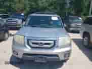 2010 Honda Pilot Touring with VIN 5FNYF3H94AB022723, listed as a IAAI auction lot 42378211 with 326,338 mi miles and . Bid and sale history available at DreamBid. Image 13.