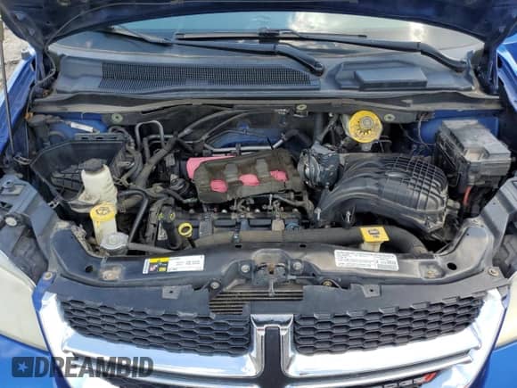 2013 Dodge Grand Caravan SXT z VIN 2C4RDGCG6DR817630, wystawiony jako Copart lot #70653035 z przebiegiem 164 634 mil mil oraz Czysty tytuł • Clean title. Historia ofert i sprzedaży dostępna na DreamBid. Obrazek 12.