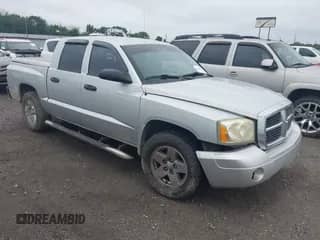 2006 Dodge Dakota SLT with VIN 1D7HE48KX6S547197, listed as a IAAI auction lot 42717572 with 135,040 mi miles and . Bid and sale history available at DreamBid. Image 1.