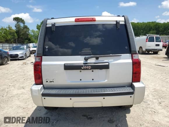 2010 Jeep Commander Sport with VIN 1J4RG4GK5AC121781, listed as a Copart auction lot 59873605 with 159,444 mi miles and Salvage title. Bid and sale history available at DreamBid. Image 6.