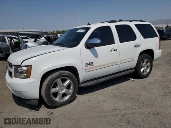 2012 Chevrolet Tahoe LT with VIN 1GNSCBE01CR103178, listed as a Copart auction lot 64452745 with 202,825 mi miles and Salvage title. Bid and sale history available at DreamBid. Image 1.