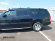 2011 Chevrolet Suburban LT with VIN 1GNSKJE34BR151246, listed as a IAAI auction lot 42520210 with 239,240 mi miles and . Bid and sale history available at DreamBid. Image 3.